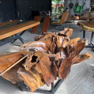 A look at a unusual wooden table with other tables around